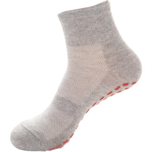 Grey gripper sock with a textured design and orange grip dots on the sole, featuring a logo.