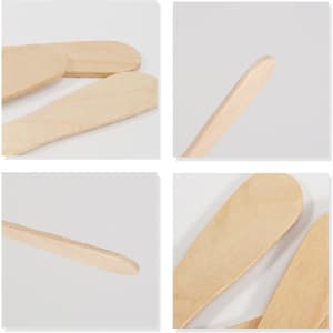 A pack of 100 wooden ice cream spoons, featuring smooth, light wooden surfaces and rounded edges.