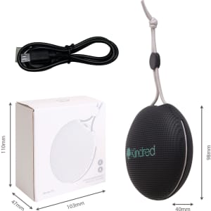 A portable black waterproof Bluetooth speaker with a microphone, accompanied by a USB charging cable and box.