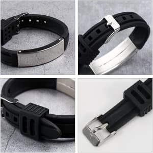 A metal strap bracelet featuring a sleek silver plate and a black rubber band with adjustable fit.