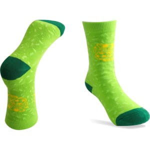 Bright green football socks with towel bottoms, featuring a patterned design and a logo.