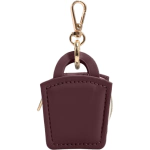 A mini PU leather jewellery box in a deep burgundy colour with a gold-tone clip and zipper closure.