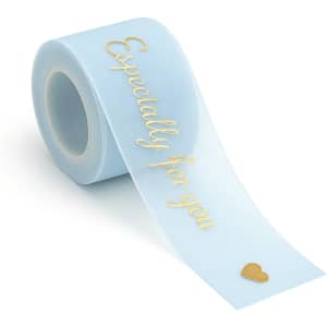 A roll of light blue organza ribbon with the phrase "Especially for you" and a gold heart design.