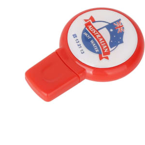 A round domed red flash drive with a white circular face and a logo featuring an Australian flag.