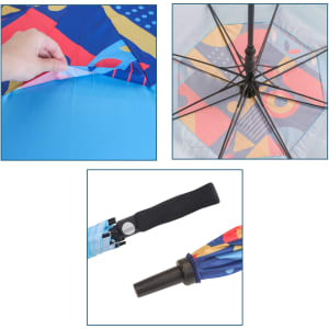 A colourful sports umbrella with a patterned canopy, featuring a blue interior and a black handle with a logo.