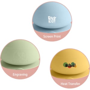 A silicone kids suction bowl in three colours: blue, green, and yellow, each featuring different branding styles.