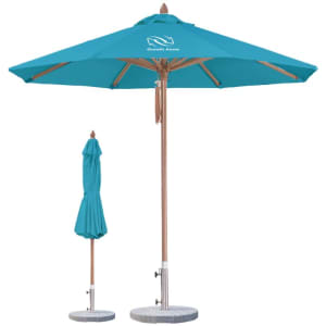 A teal, wind-resistant octagon outdoor umbrella with a wooden frame and a smaller folded umbrella beside it.