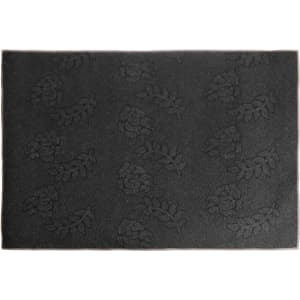 A black polyester logo mat with a textured floral pattern, suitable for office and business environments.