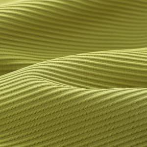 A textured, close-up view of ribbed fabric in a vibrant lime green colour.