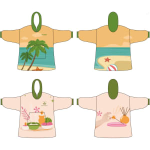 A wearable blanket in beige and green with beach-themed designs, including palm trees and decorative elements, featuring a logo.