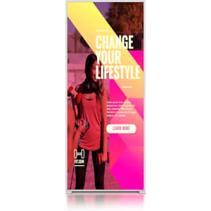 A SEG backlit LED light box display with vibrant pink and yellow graphics featuring a fitness theme and branding.