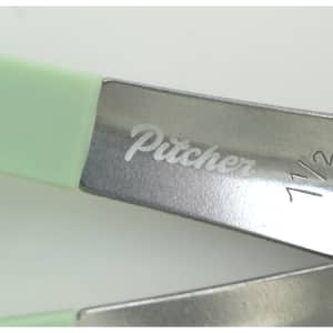 A set of measuring spoons with green handles and metal heads, featuring an engraved logo on the metal.