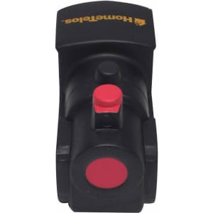 A black locomotive-shaped stress reliever with a red button and circular detail, featuring a logo on top.