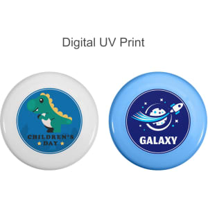 Two frisbees, one white featuring a green dinosaur, the other blue with a rocket and planet design. Both have logos.