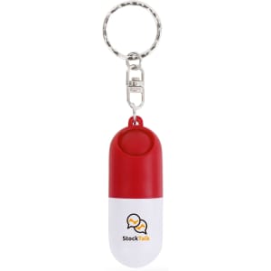 A red and white pill capsule keychain featuring a silver keyring and a logo on the surface.