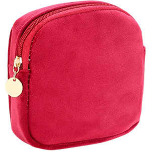 A stylish mini makeup bag in a vibrant red colour, featuring a zip closure and a small logo.