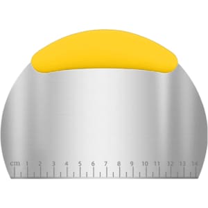 A flour cutter with a stainless steel blade and a yellow handle, featuring measurement markings along the edge.