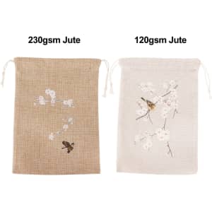 Two jute produce bags are displayed, one brown with a floral design and one cream with a butterfly and floral pattern.