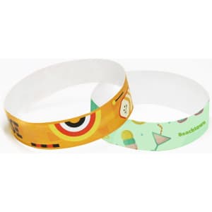 Two disposable Tyvek wristbands featuring vibrant colours and designs, one with a playful motif and the other with a beach theme.