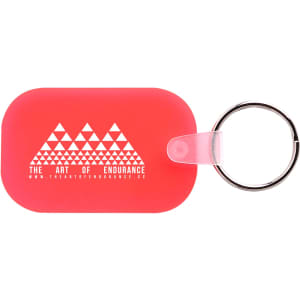 A red, oblong keyring with a silver keychain attachment and a logo featuring geometric shapes.