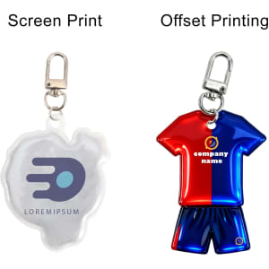 A reflective keychain in the shape of a football shirt, featuring blue and red colours with a clip attachment.