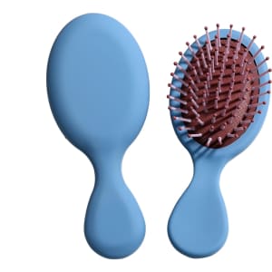A mini paddle brush with a light blue handle and a brown bristle head featuring pink tips. It has a logo.