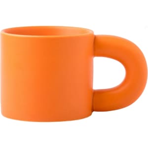 An orange ceramic coffee mug with a smooth finish and a rounded handle. It features a logo on one side.