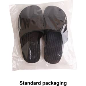 A pair of black EVA slides packaged in a clear plastic bag. The slides have a textured surface and a simple design.