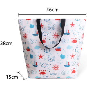 A large cooler tote bag in white, featuring a nautical print with red and blue designs, including boats and sea creatures.