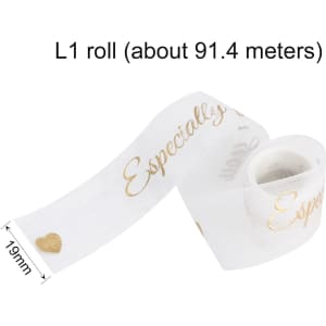 A roll of organza ribbon in white with gold lettering and a heart design, approximately 91.4 meters long and 19mm wide.