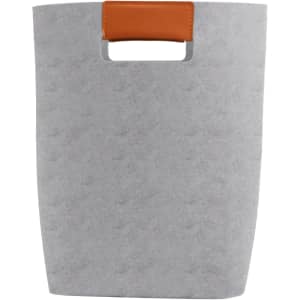 A grey felt tote bag with a brown handle, featuring a simple and modern design. It has a logo on one side.