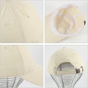 A vintage-style baseball cap in cream with distressed detailing, featuring a logo and an adjustable strap at the back.