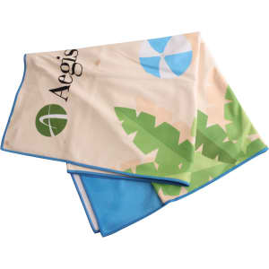 A microfibre beach towel featuring a vibrant design of leaves and shapes, with blue trim and a logo.