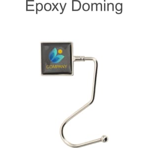 A square curved desk hook in silver, featuring a glossy black square with a logo.