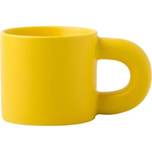 A yellow ceramic coffee mug with a distinctive handle, featuring a smooth matte finish and no patterns or designs.