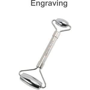 A stainless steel facial roller with two smooth ends and a central handle, featuring a logo.