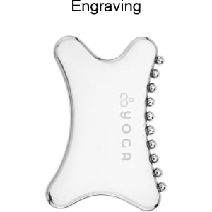 A transparent Gua Sha tool with a smooth surface and small beads on one edge, featuring a logo.