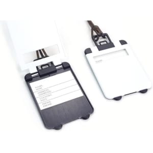 A pair of ABS luggage tags in black and white with a clear window for personal information. Each has a strap for attachment.
