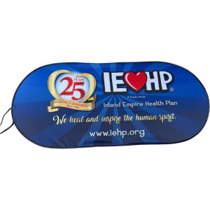 A blue promotional banner featuring a heart logo, celebrating 25 years of service with text and a website link.
