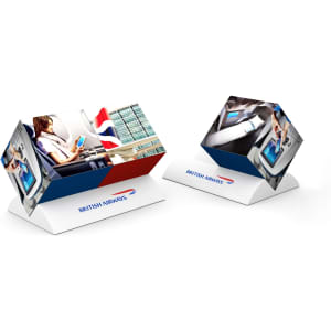 Two triangular promotional stands in red, white, and blue featuring images related to air travel, with branding present.