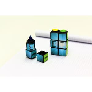 A set of four highlighters in black, blue, green, and yellow, designed in a Rubik's cube style, with a logo.