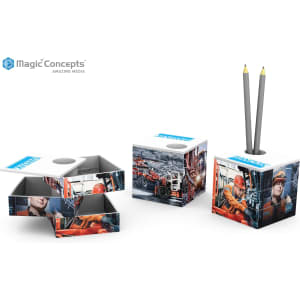A stationery box with a sliding design, featuring various graphic prints and holding two pencils. Includes a brand logo.