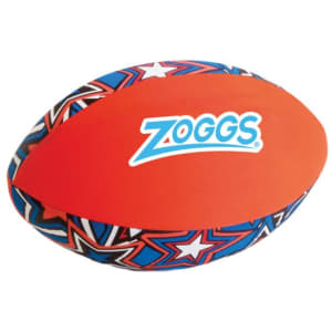 A small soft rugby ball featuring an orange surface with a colourful star pattern and a logo.