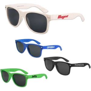 A set of four pairs of sunglasses in black, blue, green, and beige, featuring various logos on the frames.