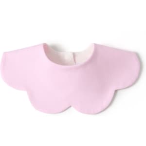 A pink baby bib with a scalloped design, made from 100% organic cotton interlock fabric. It has a button closure.