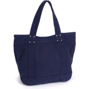 A navy tote bag with two sturdy handles and decorative studs on the front. It has a spacious and structured design.