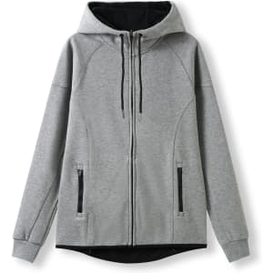 A grey women's junior hoodie made from soft cotton and bonded polar fleece, featuring a zip and pockets.