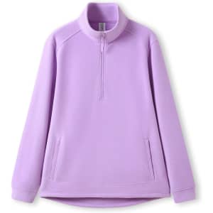 A lilac polar fleece half zip top with a high collar and side pockets, featuring a logo.