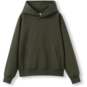 An olive green oversized hoodie with a front pocket and a hood. It features a logo on the tag.