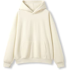 A cream oversized hoodie featuring a front pocket and a hood, with an attached branding logo.